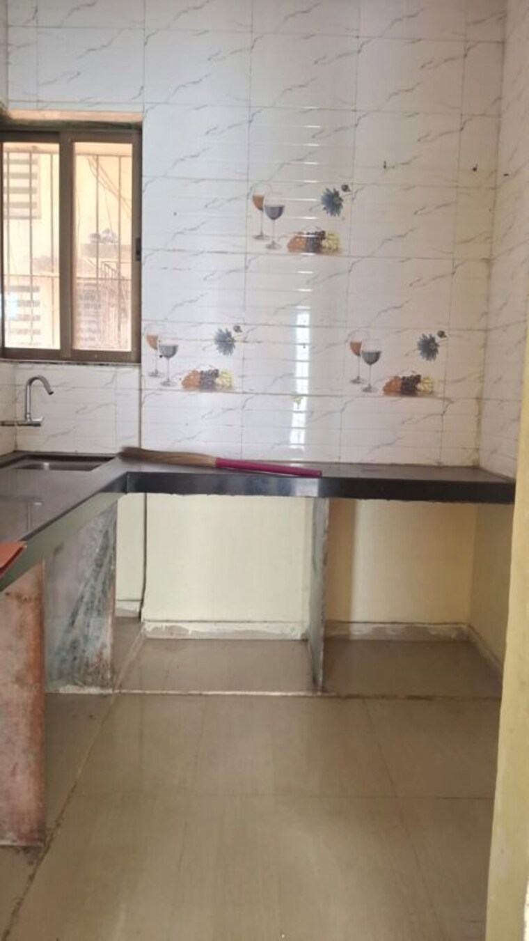 Kitchen, divine-solitaire 1 Bedroom 700 Sq.Ft. Apartment In Ulwe Navi Mumbai 10637539