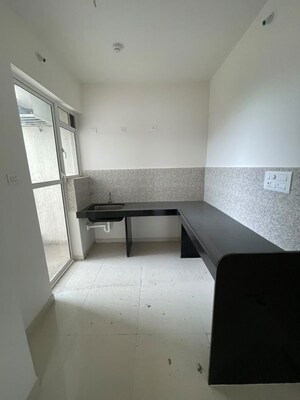 Kitchen in 2 BHK Apartment at Godrej Park Greens, Mamurdi – for Rent