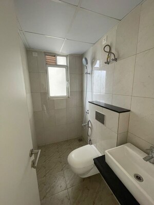 Bathroom in 2 BHK Apartment at Godrej Park Greens, Mamurdi – for Rent