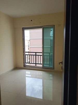Room in 2 BHK Apartment at Yogiraj CHS, Virar West – for Sale