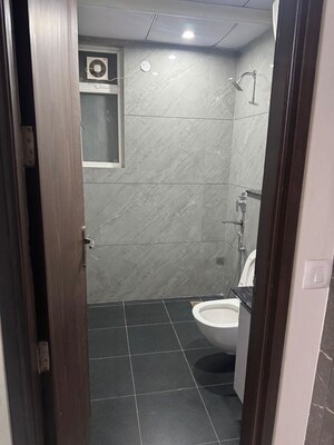 Bathroom in 3 BHK Builder Floor at Aura Homes, Patiala Road – for Rent