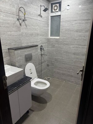 Bathroom in 3 BHK Builder Floor at Aura Homes, Patiala Road – for Rent