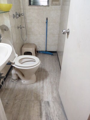 Bathroom in 4 BHK Apartment at Indra Darshan Apartment, Andheri West – for Sale