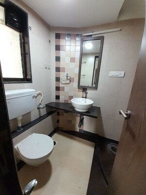 Washroom in 4 BHK Apartment at Belscot Chs Ltd, Andheri West – for Sale