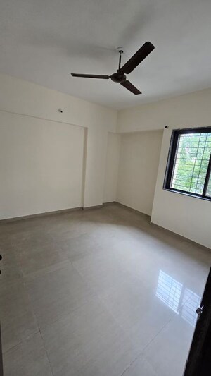 Room in 2 BHK Apartment at Wadegaon – for Rent