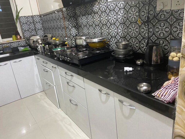 Kitchen, lodha-amara 1.5 Bedroom 650 Sq.Ft. Apartment In Kolshet Road Thane 10637799