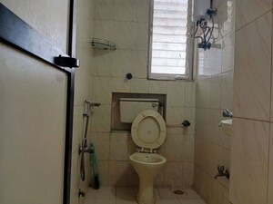 Bathroom in 1 BHK Apartment at Prakash Nagar CHS, Mahim – for Rent