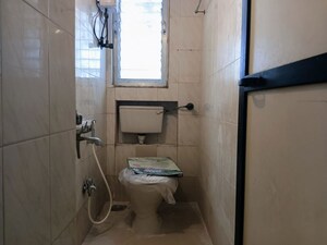 Bathroom in 1 BHK Apartment at Prakash Nagar CHS, Mahim – for Rent