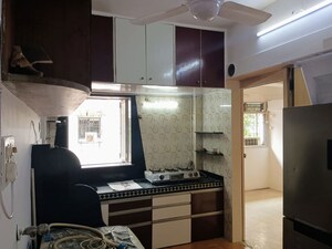 Living Room in 1 BHK Apartment at Prakash Nagar CHS, Mahim – for Rent