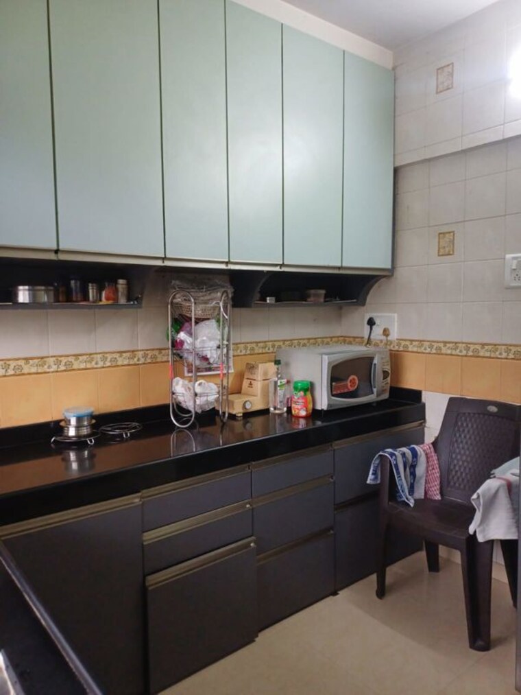 Kitchen, rose-blossom-chs 2 Bedroom 719 Sq.Ft. Apartment In Mahim West Mumbai 10629841