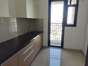 Kitchen in 1 BHK Apartment at MICL Aaradhya Parkwood, Mira Road – for Rent