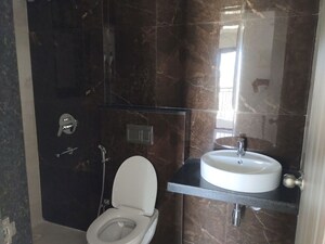 Bathroom in 1 BHK Apartment at MICL Aaradhya Parkwood, Mira Road – for Rent