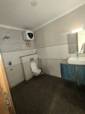 Bathroom in 3 BHK Builder Floor at Rohini Sector 7 – for Sale