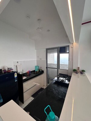 Living Room in 1 BHK Apartment at Dynamix Avanya, Dahisar East – for Rent