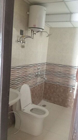 Bathroom in 3 BHK Apartment at Govind Vihar – for Rent