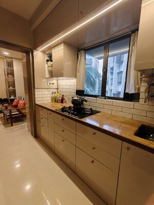 Kitchen in 2 BHK Apartment at Nivara Deepanjali CHSL, Vile Parle East – for Rent