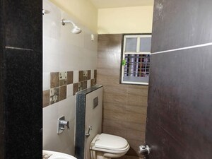 Bathroom in 2 BHK Apartment at Suyog Padmavati Hills, Bavdhan – for Rent