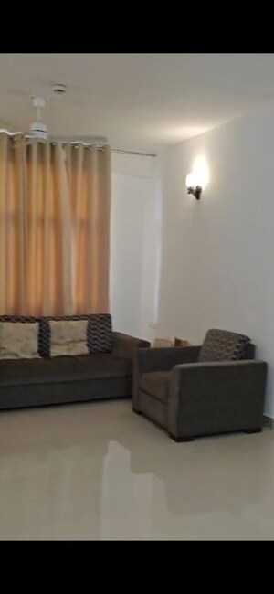 Living Room in 4 BHK Apartment at Sanchar Nest Palm Heights, Wave City – for Rent