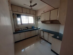 Kitchen in 2.5 BHK Apartment at Dahanukar Colony – for Rent