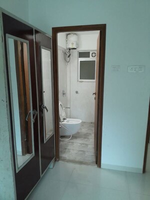 Building Lobby in 1 BHK Apartment at Romell Allure, Borivali East – for Rent