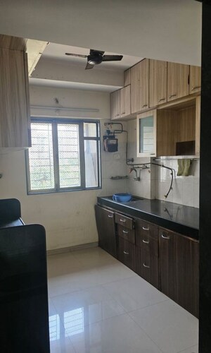 Kitchen in 1 BHK Apartment at Acme Complex 2A, Goregaon West – for Sale