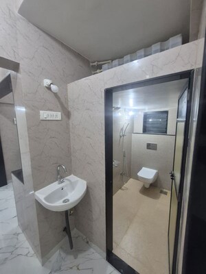 Bathroom in 2 BHK Apartment at Ankur Enclave, Mira Road – for Sale