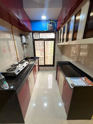 Kitchen in 1 BHK Apartment at Adityaraj Breeze, Vikhroli East – for Rent