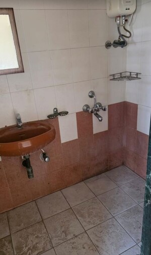 Bathroom in 2 BHK Apartment at Kingston Classic, Malad West – for Rent