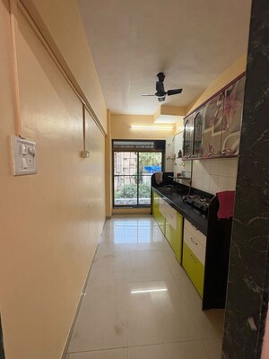 Kitchen in 2 BHK Apartment at Manisha Purti CHS, Goregaon West – for Rent