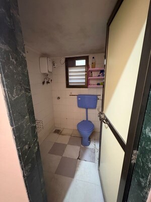 Bathroom in 2 BHK Apartment at Manisha Purti CHS, Goregaon West – for Rent