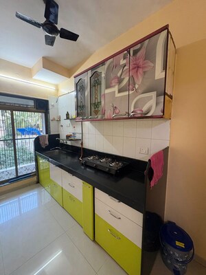 Kitchen in 2 BHK Apartment at Manisha Purti CHS, Goregaon West – for Rent
