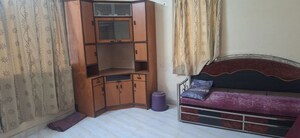 Living Room in 1 BHK Apartment at Wadgaon Sheri – for Rent