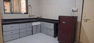 Kitchen in 1 BHK Apartment at Wadgaon Sheri – for Rent