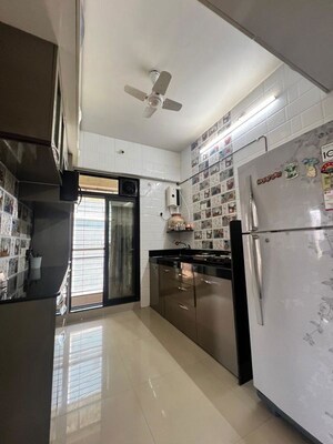 Kitchen in 2 BHK Apartment at Haware Estate, Kasarvadavali – for Rent