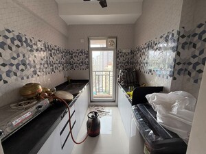 Team Area in 1 BHK Apartment at Raunak Bliss, Ghodbunder Road – for Rent