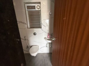 Bathroom in 1 BHK Apartment at Raunak Bliss, Ghodbunder Road – for Rent