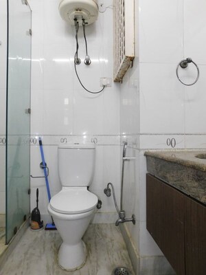 Bathroom in 3 BHK Builder Floor at Kailash Colony – for Sale