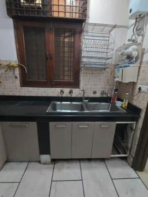 Kitchen in 3 BHK Builder Floor at Kailash Colony – for Sale