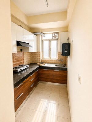 Kitchen in 2 BHK Apartment at Shree Vardhman Mantra, Sector 67 – for Rent
