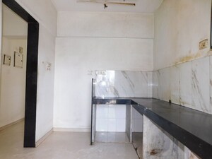 Kitchen in 2 BHK Apartment at Mahim East – for Sale