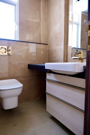 Bathroom in 3 BHK Apartment at Smart World Orchard, Sector 61 – for Rent