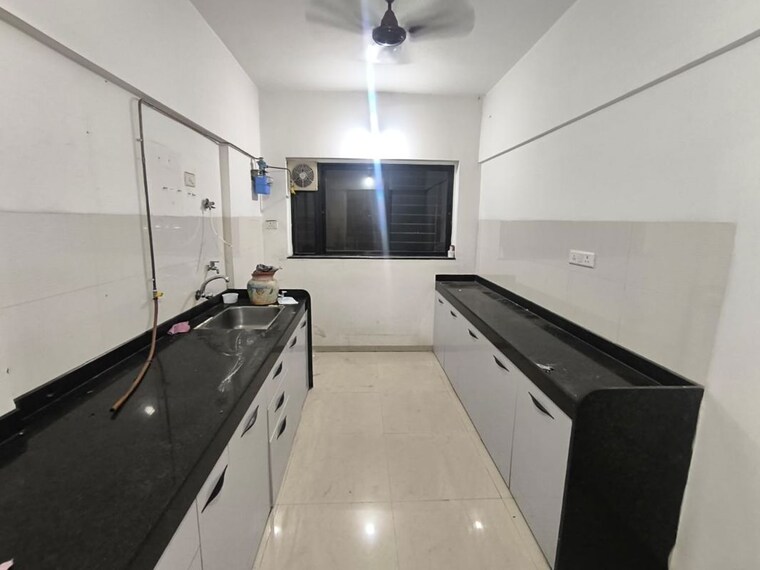 Kitchen, kalpataru-estate-phase-2-building-5-and-6-society 3 Bedroom 1100 Sq.Ft. Apartment In Pimple Gurav Pune 10638514