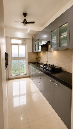 Kitchen in 3 BHK Apartment at Godrej Emerald, Ghodbunder Road – for Rent