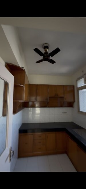 Kitchen in 2 BHK Apartment at Ansal Valley View Estate, Gwal Pahari – for Rent