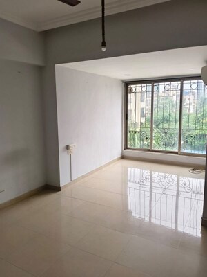 Room in 2 BHK Apartment at Bandra West – for Rent