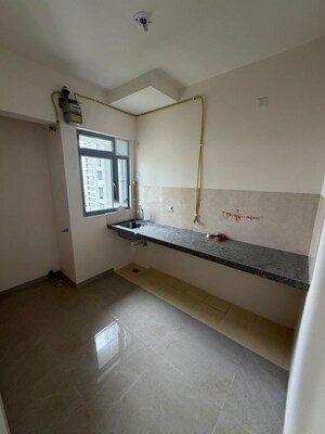 Kitchen in 1 BHK Apartment at Piramal Vaikunth, Balkum Pada – for Rent