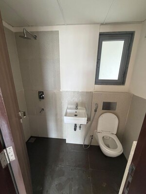 Bathroom in 2 BHK Apartment at Piramal Vaikunth, Balkum Pada – for Rent