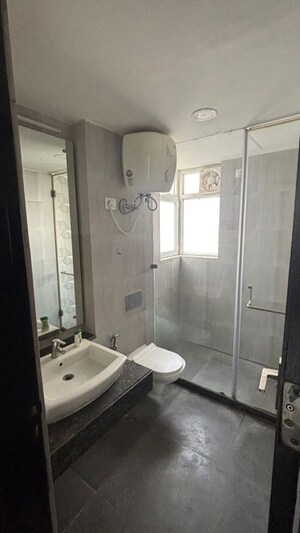 Bathroom in 3 BHK Apartment at Microtek Greenburg, Sector 86 – for Rent