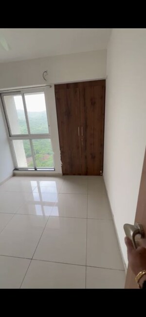 Bathroom in 1 BHK Apartment at Raunak Unnathi Greens, Kasarvadavali – for Rent