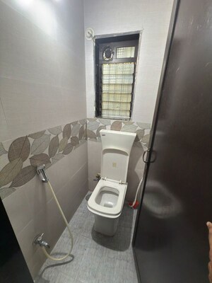 Bathroom in 3 BHK Apartment at Nilkanth Apartment Naupada, Naupada – for Rent